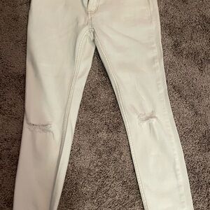 Free people white jeans. W tan stitching